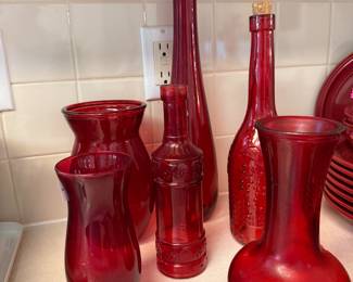$30- ASSORTED RED GLASS BOTTLES