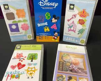 CRICUT Cartridges Hoot N Holler, Flower Shoppe, Elegant Edges, Mickey Font, And Sophie.