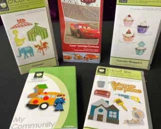 CRICUT Cartridges Carousel, CARS, Cupcake Wrappers, My Community, And Handy Man