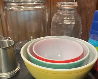Vintage kitchenware and glassware, including these colorful Pyrex bowls.