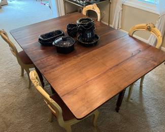 Antique drop-leaf dining table.