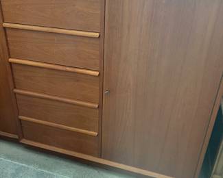 One of a pair of Teak wardrobes