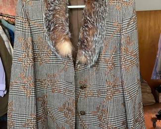 Bigio two piece skirt and jacket set trimmed in fur