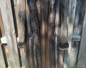 Full length fur coat with braided fur detail