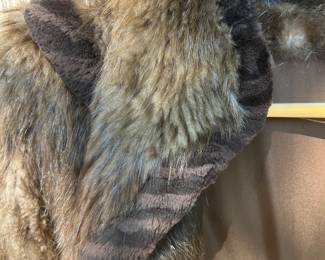 Full length fur coat with braided fur detail