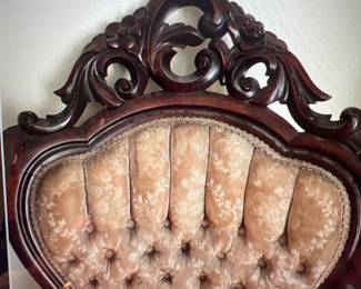 One of a pair of Victorian arm chairs