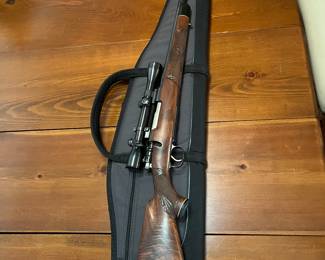 Winchester 264 magnum custom-made bolt action is a Mauser and a Redfield scope.
