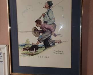 Many framed Norman rockwell prints