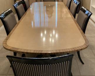Dining room table shown at full length (est. 120") with eight chairs. Pads included will cover full length.