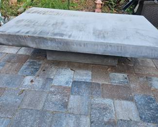 This concrete fiber coffee table is located at my house too heavy to move but it is two pieces.