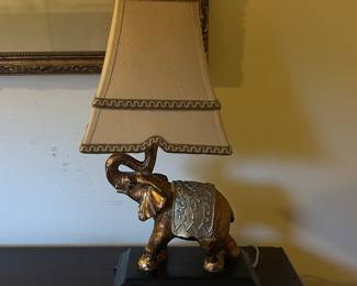 Lamp with a brass finished elephant base. 