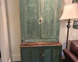 Primitive step back cupboard with fine patina.   Great for storage. 