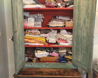 A wide variety of table linens, placemats, napkins, and napkin holders.  