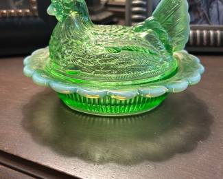 Vibrant green Hen on a Nest glass collectible.  There is also a pink one and a green and white milk glass hen.  