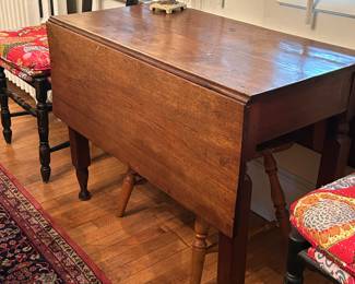 Antique drop leaf table.   
