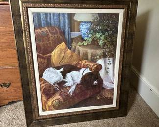 Wall decor featuring a napping dog. 