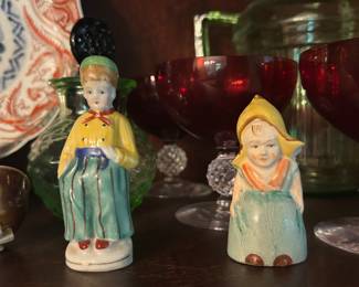 Figurines, and other small pieces including salt and pepper shakers, small bowls, miniature tea set and other tea and saucer items. 
