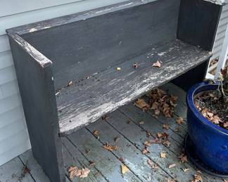 Outdoor and garage items including a a primitive bench, large wire spool, camping gear, some hardwood flooring and other wood eminent, old school desks, and much vintage planters that are one of a kind! 