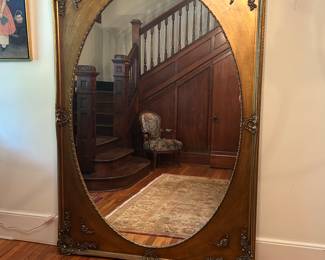 Grand and large mirror.  A true statement piece for a foyer or other large space.  