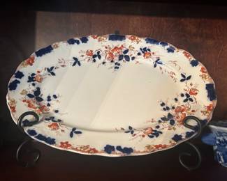 Vintage platters along with a ton of other collectible glass items including Fenton glass, candy dishes, glass cut serving bowls, vintage planters, pottery, figurines, milk glass, hens on nest, punch bowls with matching cups, pitchers, and so much more.  