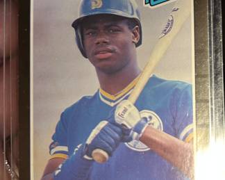 Ken Griffey Jr  Dinruss Rookie card.  This is an error card as well.   There is additional baseball card offerings as well.  