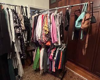 An abundance of ladies designer clothing, shoes, handbags, wallets, scarves.  Sizes will run from 2-16. 