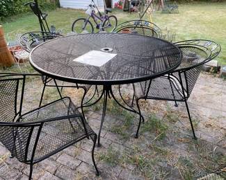 Woodard wrought iron table and chairs