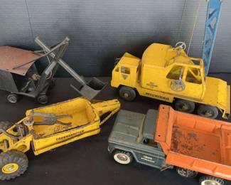 Variety Of Vintage Construction Toys And Trucks