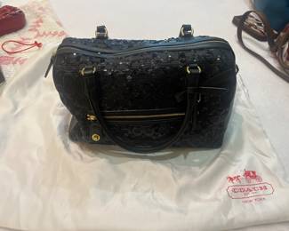 Sequence, black Coach handbag