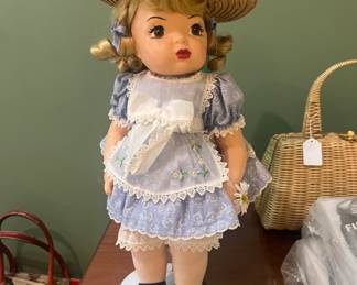 Doll on stand