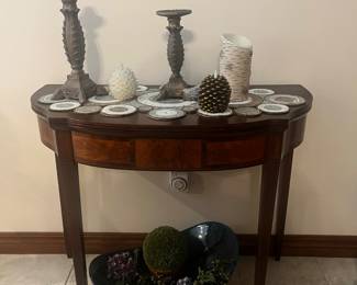 Side table, expands for more space. Large assortment of battery operated candles and candlesticks.