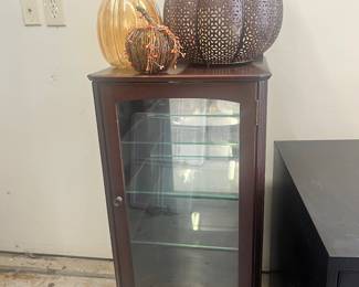 Glass front wood cabinet, metal and glass pumpkin