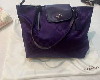 New ladies, purple coach handbag
