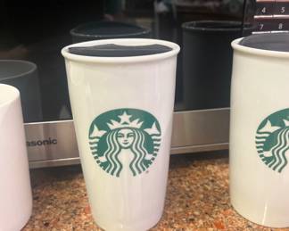 Selection of Starbucks, cups, and mugs