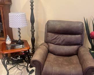 Brown electric recliner, iron, and glass top side floor, lamp, and table lamp