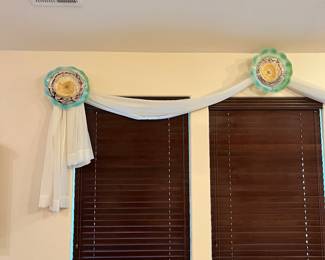 Three art glass platters Marano style. Shown here as curtain “rod”
