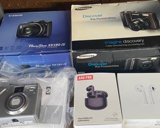 Assorted Cameras (Canon, HP)