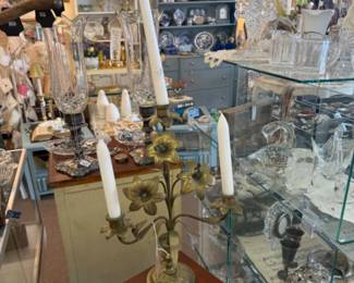brass candelabra, glassware