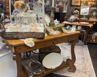 Beautiful solid wood table, silver serving piece, decor