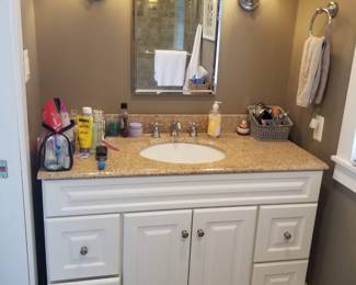 Updated bath vanity; vanity mirror; vanity lights