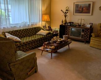 Step back in time, excellent condition, beautiful 1960s sofa, lazy boy chair, 1950s coffee table and end tables.
