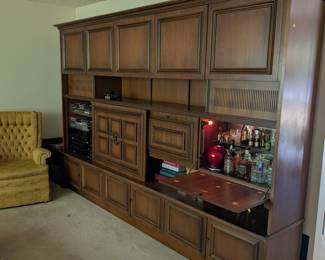 German schrank with bar, stereo setup with built in speakers.