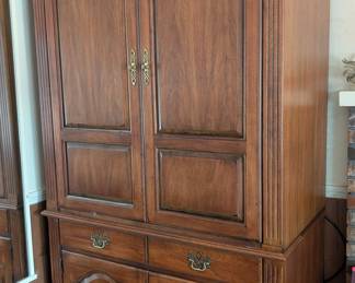 Thomasville armoire for clothing storage.