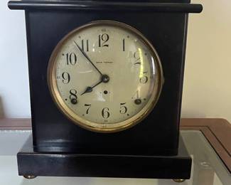 Seth thomas black mantle shelf clock. Runs well.