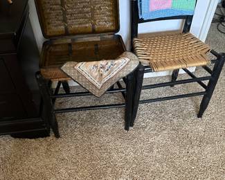 Set of four black ladder back chairs