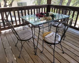 Metal and glass patio table