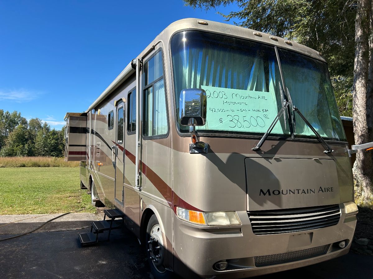 2003 Mountain Aire motor home, gas motor, 42k miles, runs great! Asking  $38,500.00