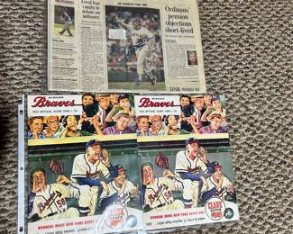 Rollie Fingers' autograph on the Journal Sentinel newspaper. Two 1954 Milwaukee Braves Official Score Booklets.