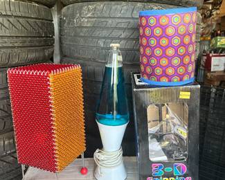 Three cool lamps: left is a beaded mood lamp, lava lamp in the middle and a 3-D spinning lamp. I took the shade out so you could see the 3-D effect.