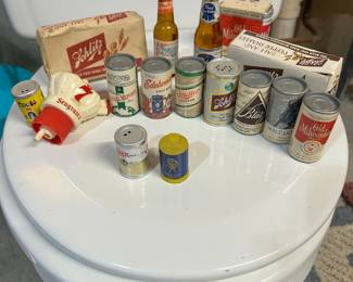 An assortment of beer salt & peppers. NOTE: toilet NFS!